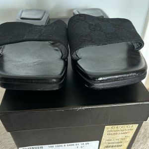 Gucci sandals wooden bottoms.